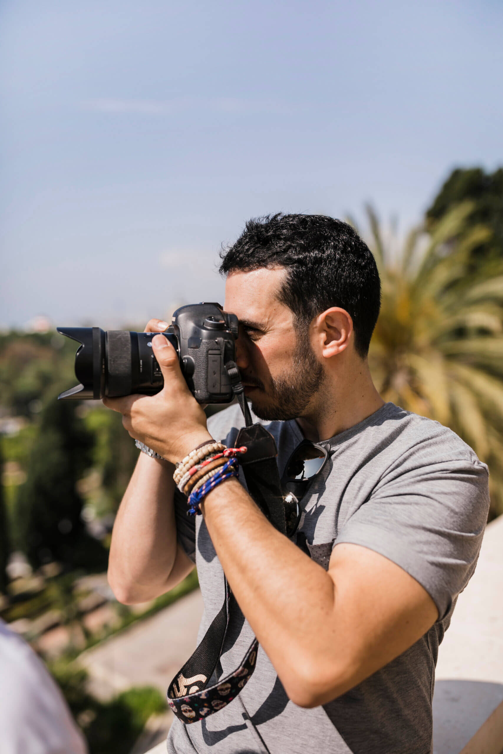 professional-indian-young-photographer-taking-photos-studio-with-leight